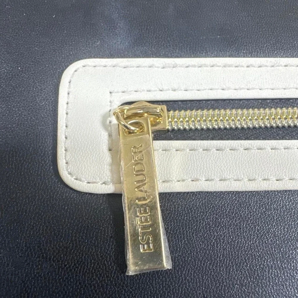 Estee Lauder cosmetic faux leather train case